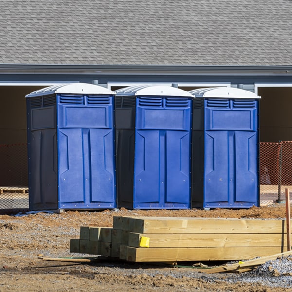 what is the cost difference between standard and deluxe portable restroom rentals in Woodall OK